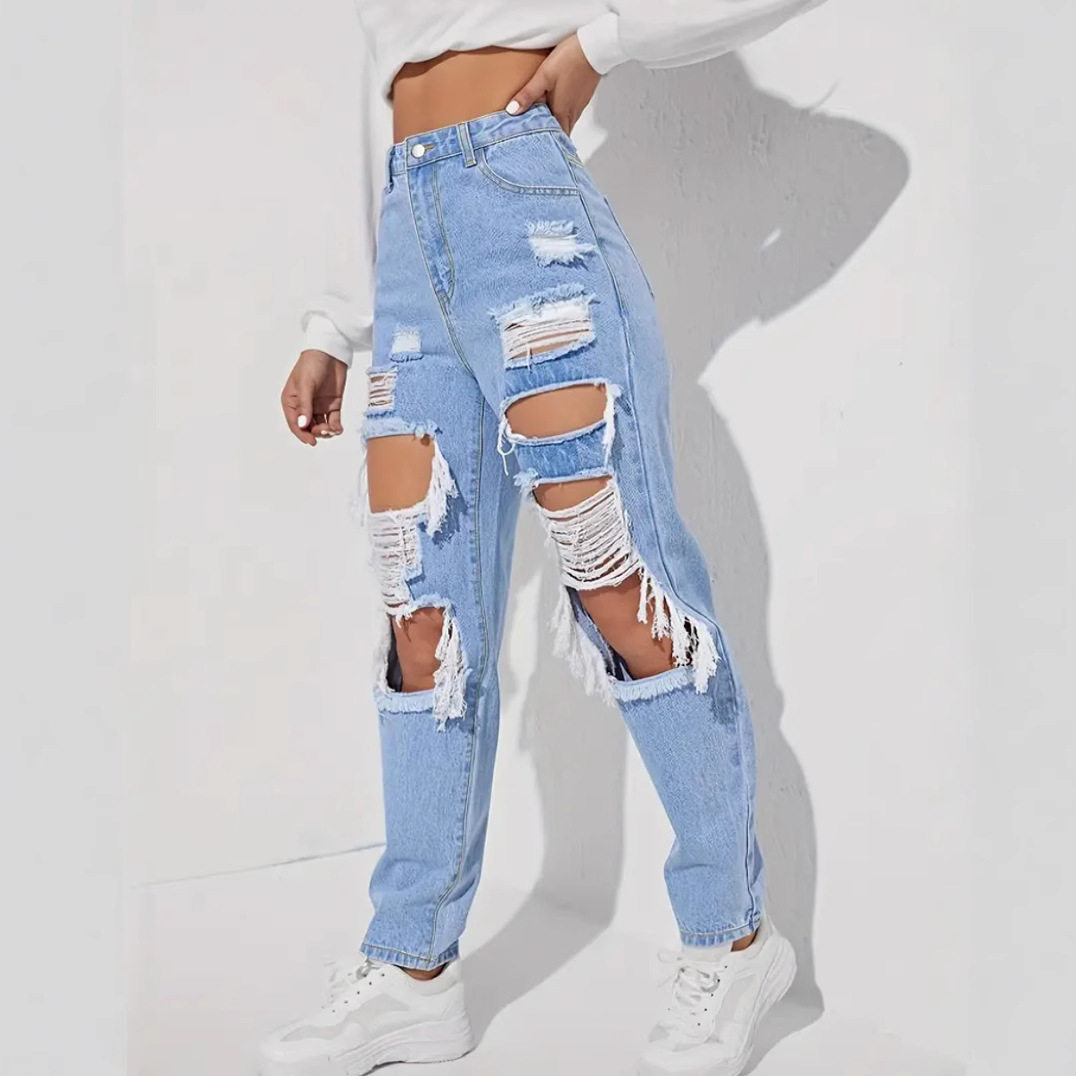 Ladies' ripped denim pants washed with water女士破洞牛仔长裤