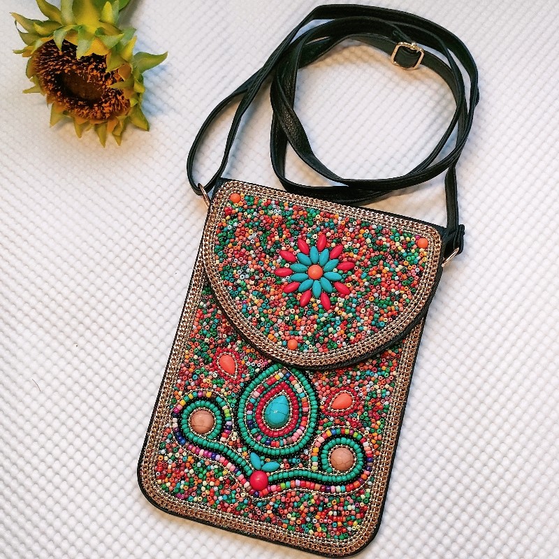 新疆复古米珠包包蒙古民族风小众斜挎包云南旅游手提包手机皮革包,箱包皮具/热销女包/男包,手机包,淘宝优惠券,粉丝福利购,淘宝优惠卷