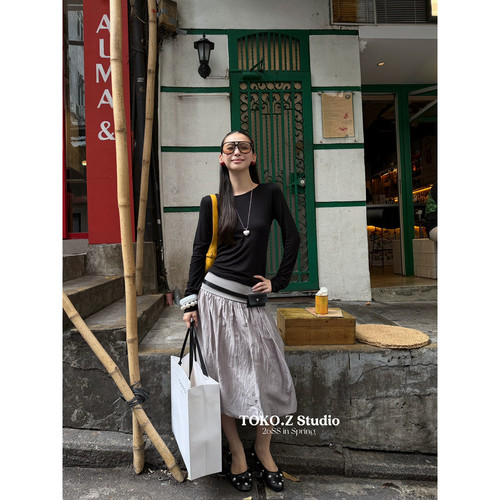 文艺压褶拼接翻边花苞半身裙