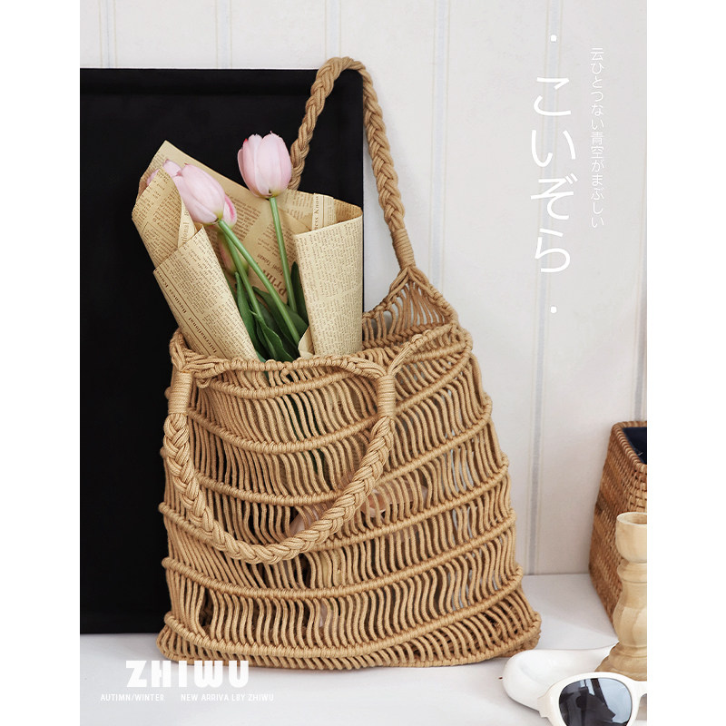 ZHIWU~慵懒气质夏日镂空沙滩包chic手提海边度假棉绳编织女包百搭