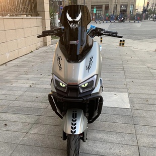 适用台铃火眼机甲3封神电动车风挡毒液装饰贴纸灯眉贴定风翼改装