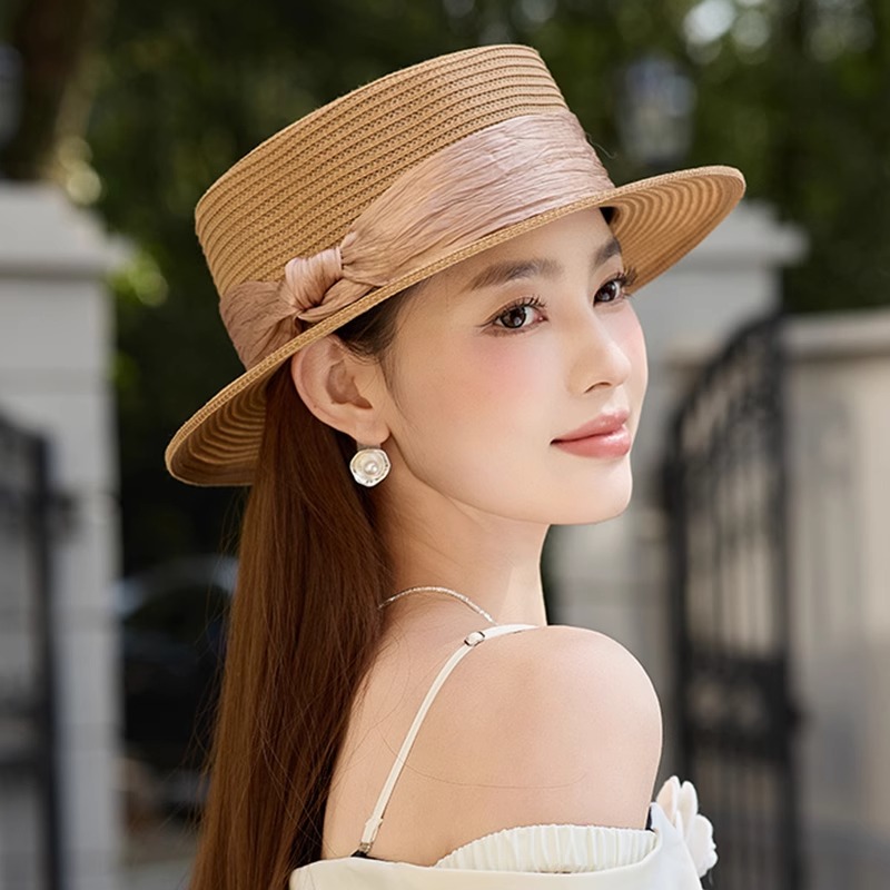 轻奢平顶草帽女夏季海边度假出游沙滩帽优雅礼帽遮阳防紫外线女帽