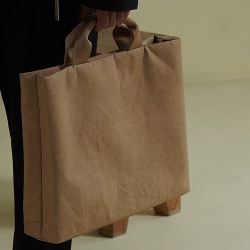 索然轻盈减震文艺质感手提电脑包