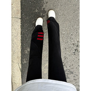 斜杠三条纹红黑撞色拼接显瘦微喇牛仔裤男春秋美式高街直筒休闲裤