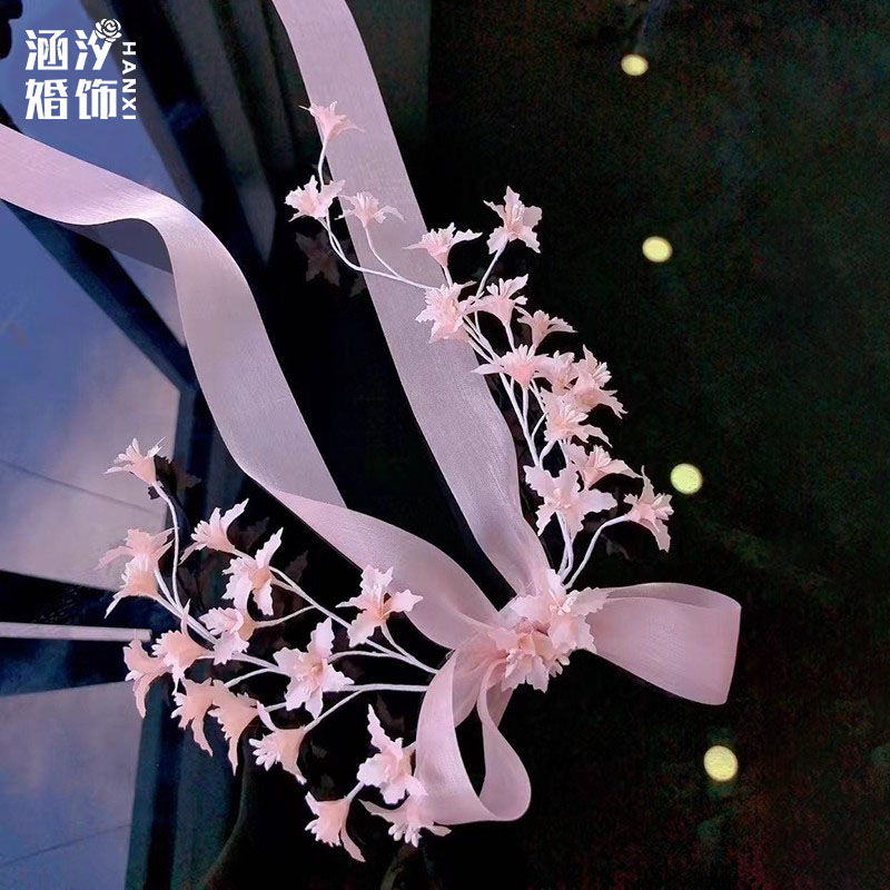 粉色仙气羽毛花朵蝴蝶结飘带头饰