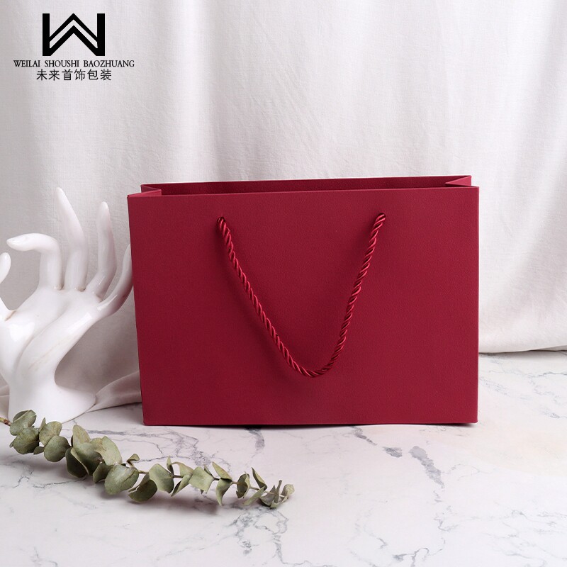 购物纸袋子礼品袋珠宝首饰包装袋荔枝纹横版手提袋三股绳印logo