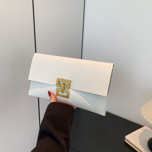 芊舒祺手拿包压花小潮流