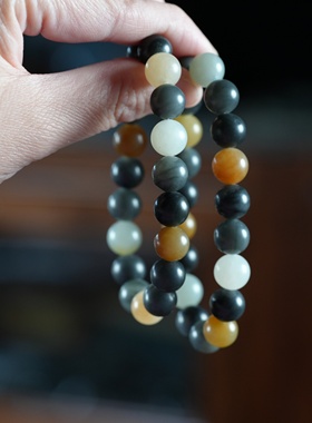 驼铃咏叹。新疆楼兰三色和田玉糖青花籽多宝柔光10毫米手链串女