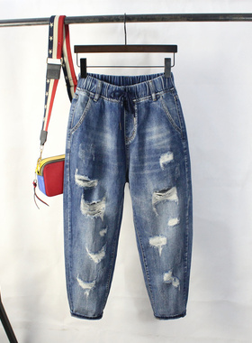 女士破洞哈伦牛仔裤显瘦九分裤宽松加肥加大码胖mm松紧腰2026春夏