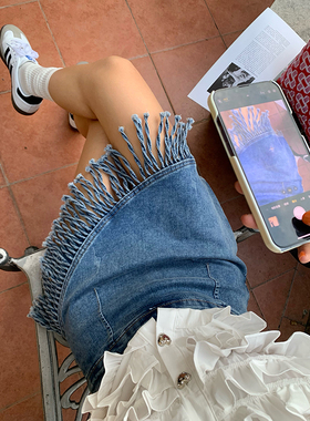 今屿花花 蓝色流苏不对称a字高腰半身裙女2025新款夏天短裙牛仔裙