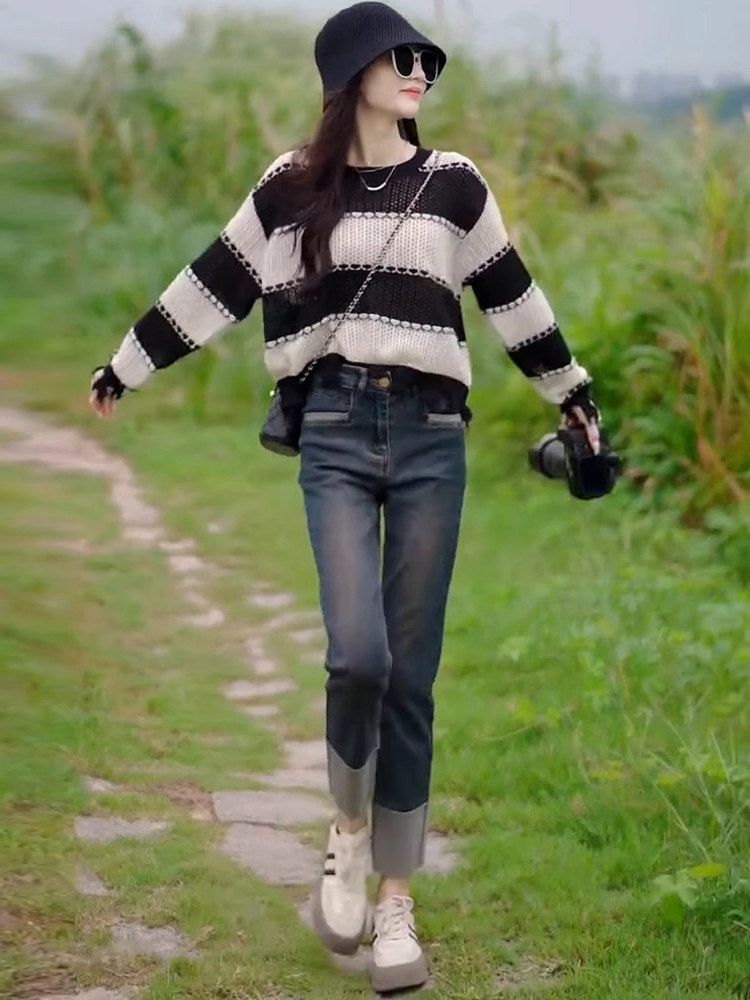 镂空针织衫女春秋薄款2025新款设计感小众宽松慵懒风条纹毛衣上衣