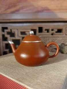 宜兴原矿早期包银口高梨紫砂壶一把,独空出水,150cc