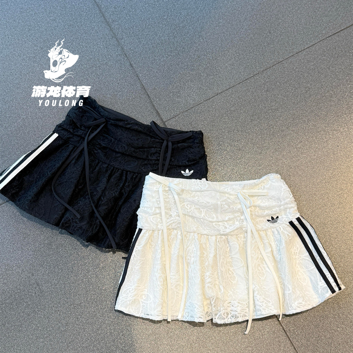 阿迪达斯adidas三叶草女缎带蕾丝A字运动百褶裙短裙KU4760 KU4761