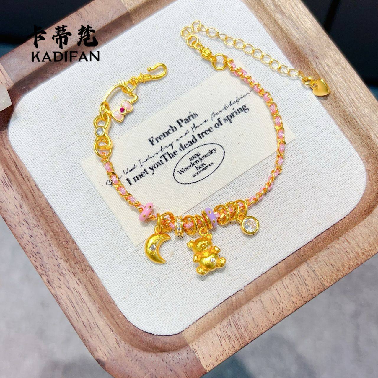 黄金色沙金可爱点钻kt猫月亮小熊转运环粉色编织手链女士彩环手串
