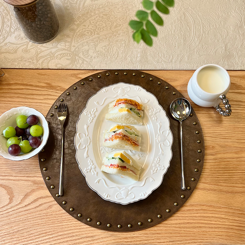 中古风圆形皮革复古餐垫高级感轻奢高端防水防油餐厅餐盘碗垫