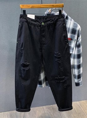 N潮牌微跨黑色破洞牛仔裤