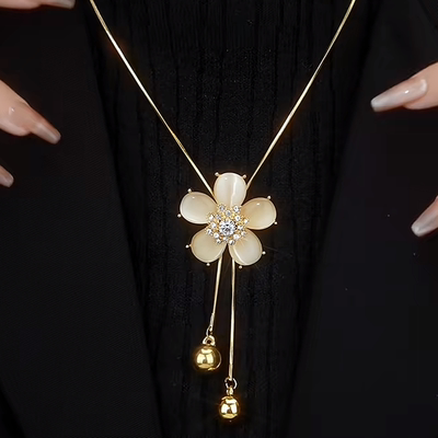 气质温柔猫眼石花朵流苏毛衣链秋冬新款时尚百搭长款可调节项链女