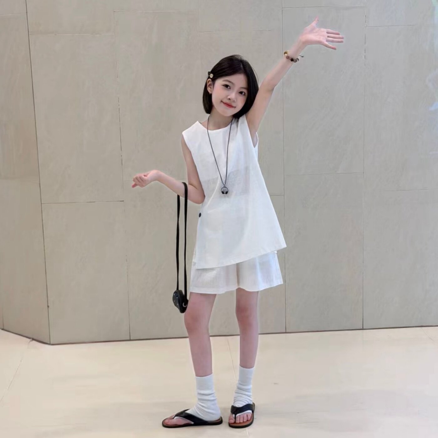 女童2026侧边纽扣背心套装夏季新款中大童棉麻无袖上衣短裤两件套