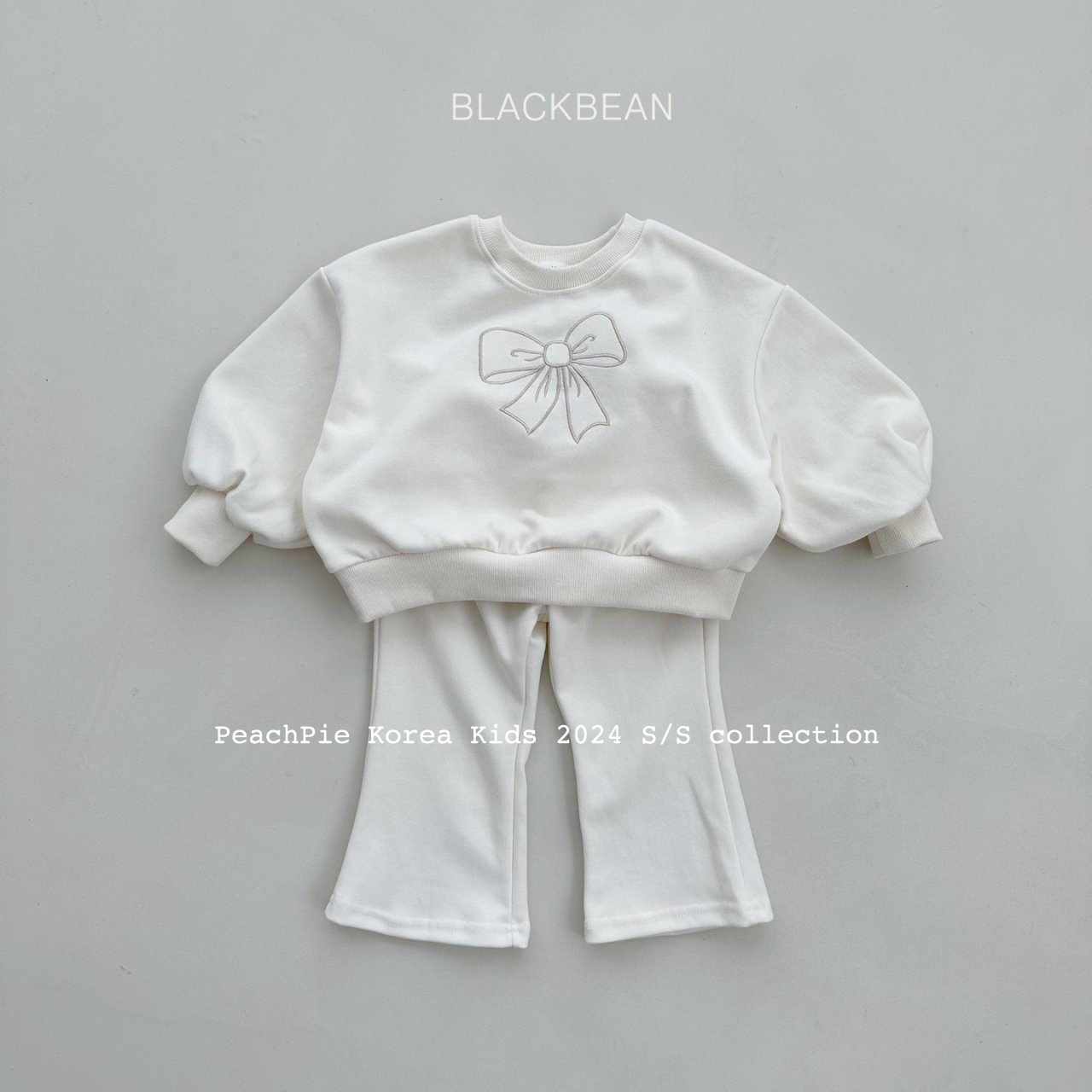 女童蝴蝶结泡泡袖卫衣喇叭裤套装