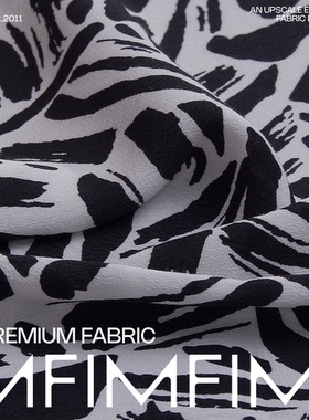 斑马色黑色不规则图案面料 幅宽131CM克重180G/米