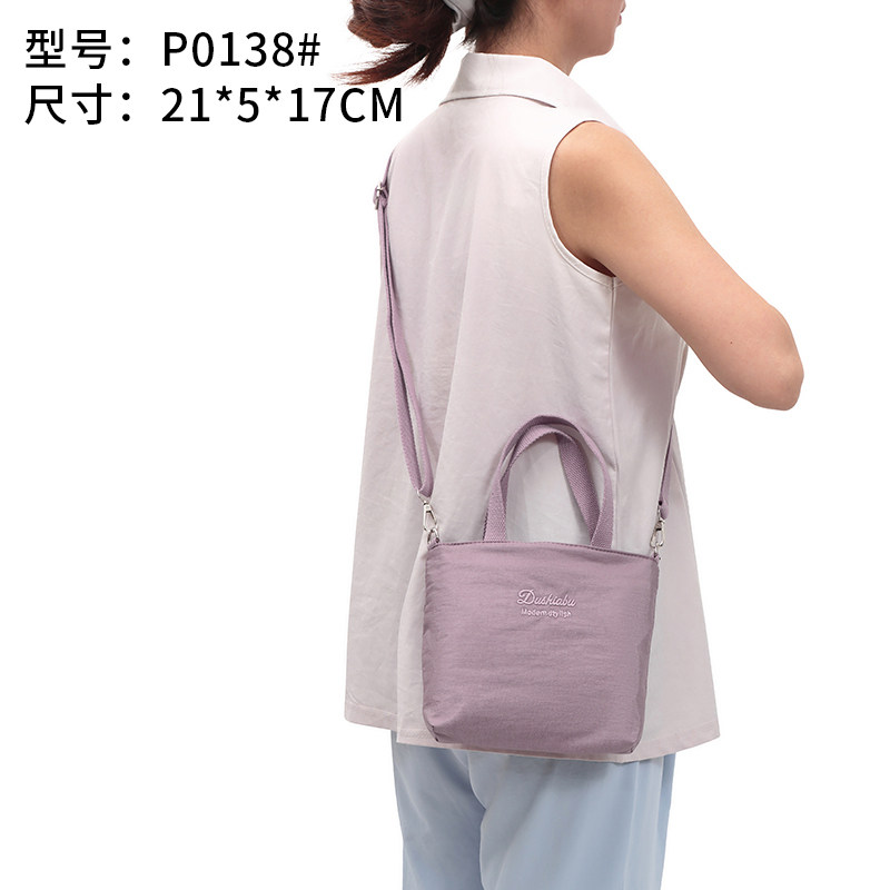 跨境纯色潮时尚手提斜挎两用手机包零钱包休闲通勤小手拎化妆袋