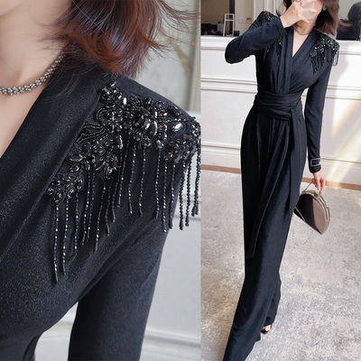 飞姐定制新款时尚连体裤女亮钻垫肩收腰V领修身假两件连体裤