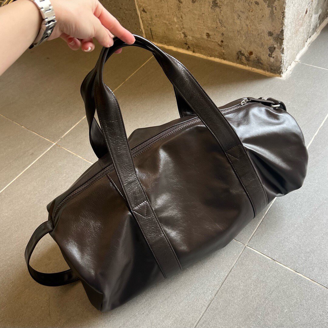 油蜡牛皮质感好柔软斜挎单肩手提男女通用大容量外出旅行包健身包