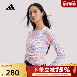 adidas阿迪达斯三条纹舞动系列LOGO满印长袖2026春女T恤 KR7600