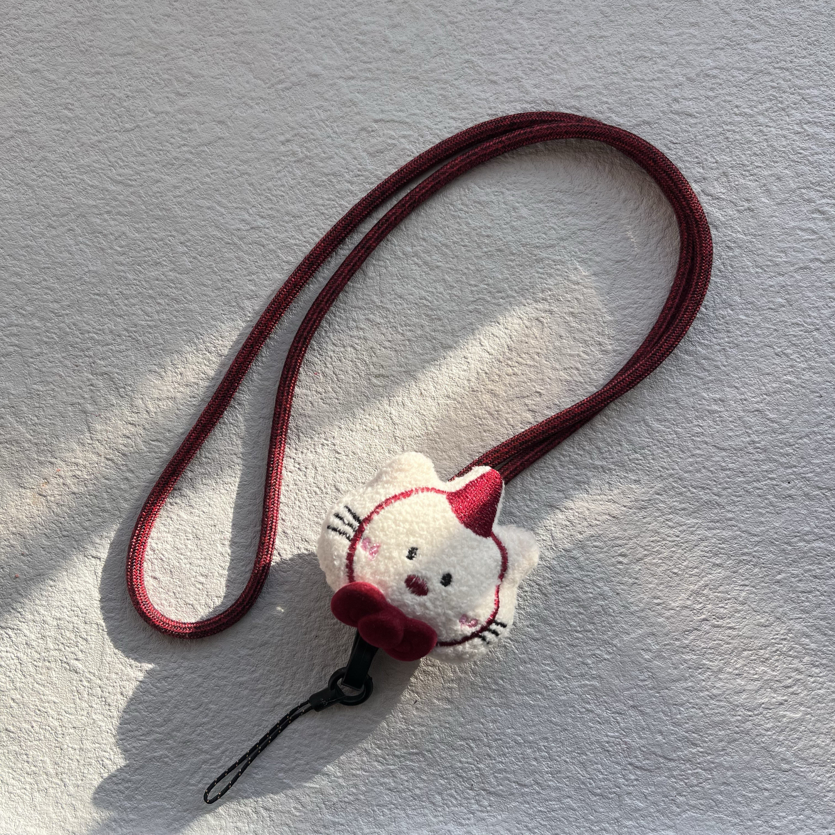 升级款可爱森系蝴蝶结猫咪圆绳花纱酒红手机壳指环扣毛衣链挂脖绳