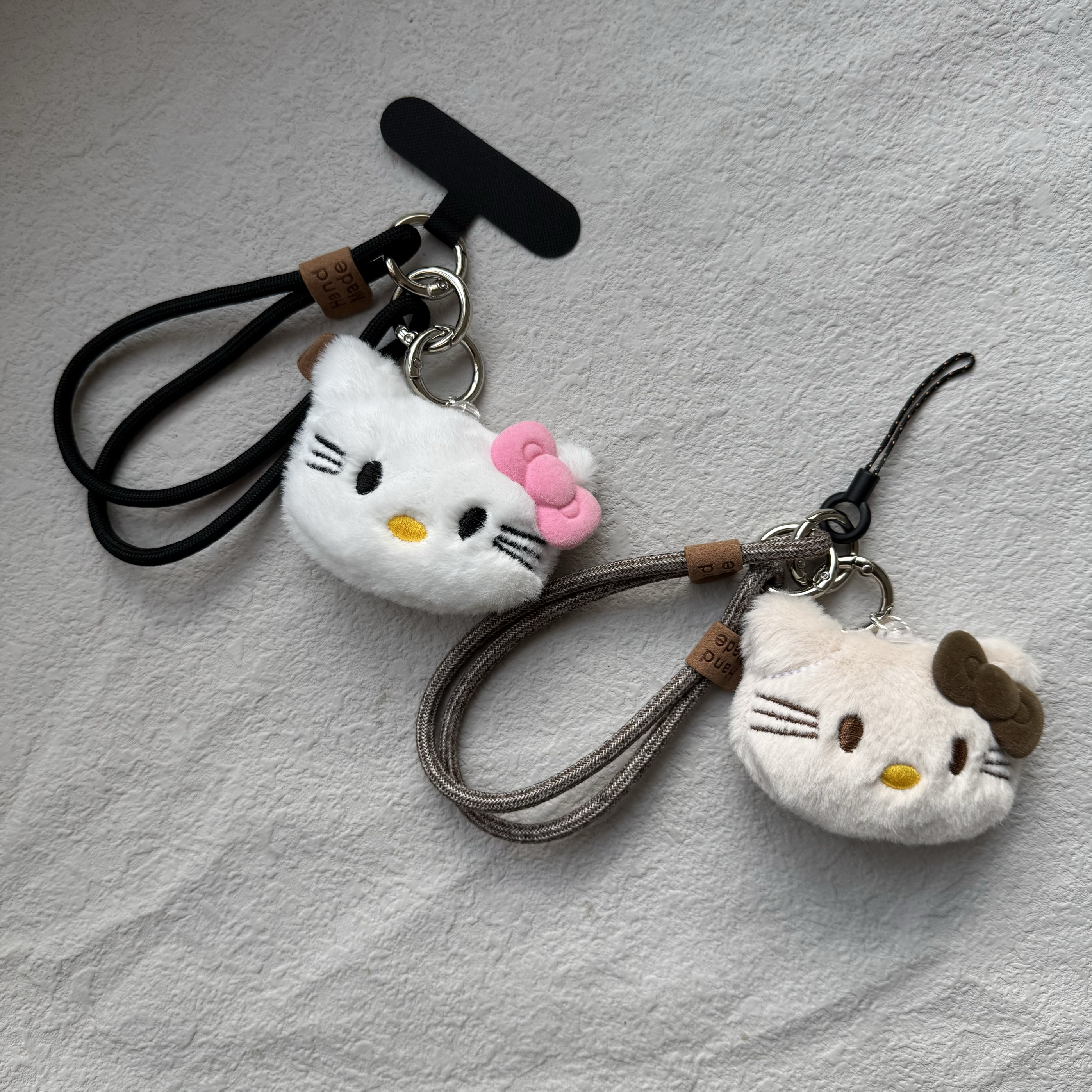 圆绳双拼笑脸毛绒蝴蝶结猫咪公仔玩偶相机ccd挂件手机链钥包挂饰