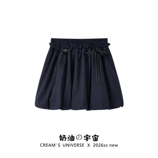 女松紧腰蓬蓬a字半身裙子 立体蝴蝶结藏青色花苞短裙裤 奶油 宇宙