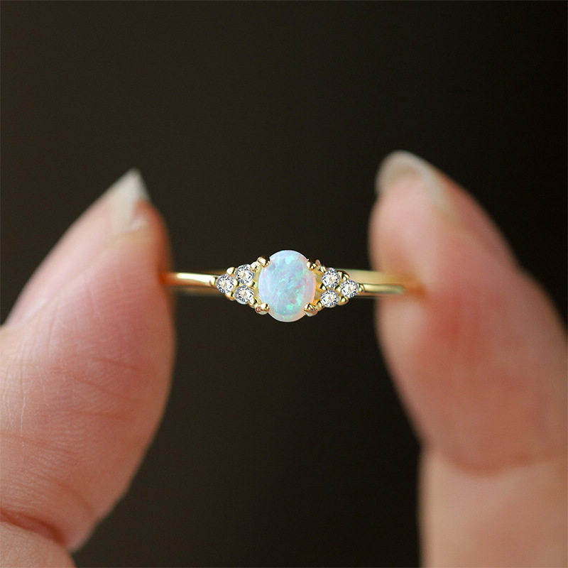 S925银澳宝蛋白石简约婚戒