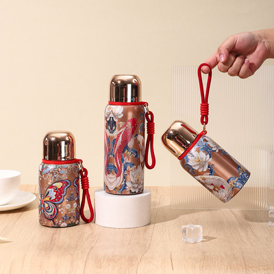 爆款316好运金孔雀轻奢保温杯高颜值大容量提绳杯便携女士水杯