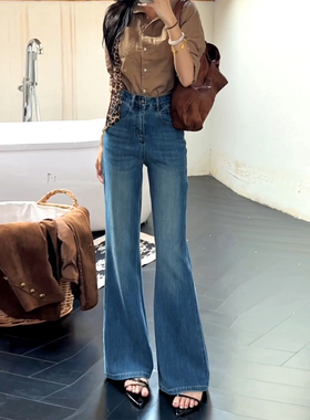 蓝色气质高级感微喇牛仔裤女早秋2026新款复古高腰阔腿直筒喇叭裤