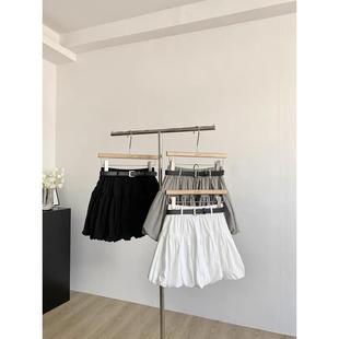 2025年夏季新款韩版休闲时尚百搭高腰防走光A字花苞短裙配皮带女