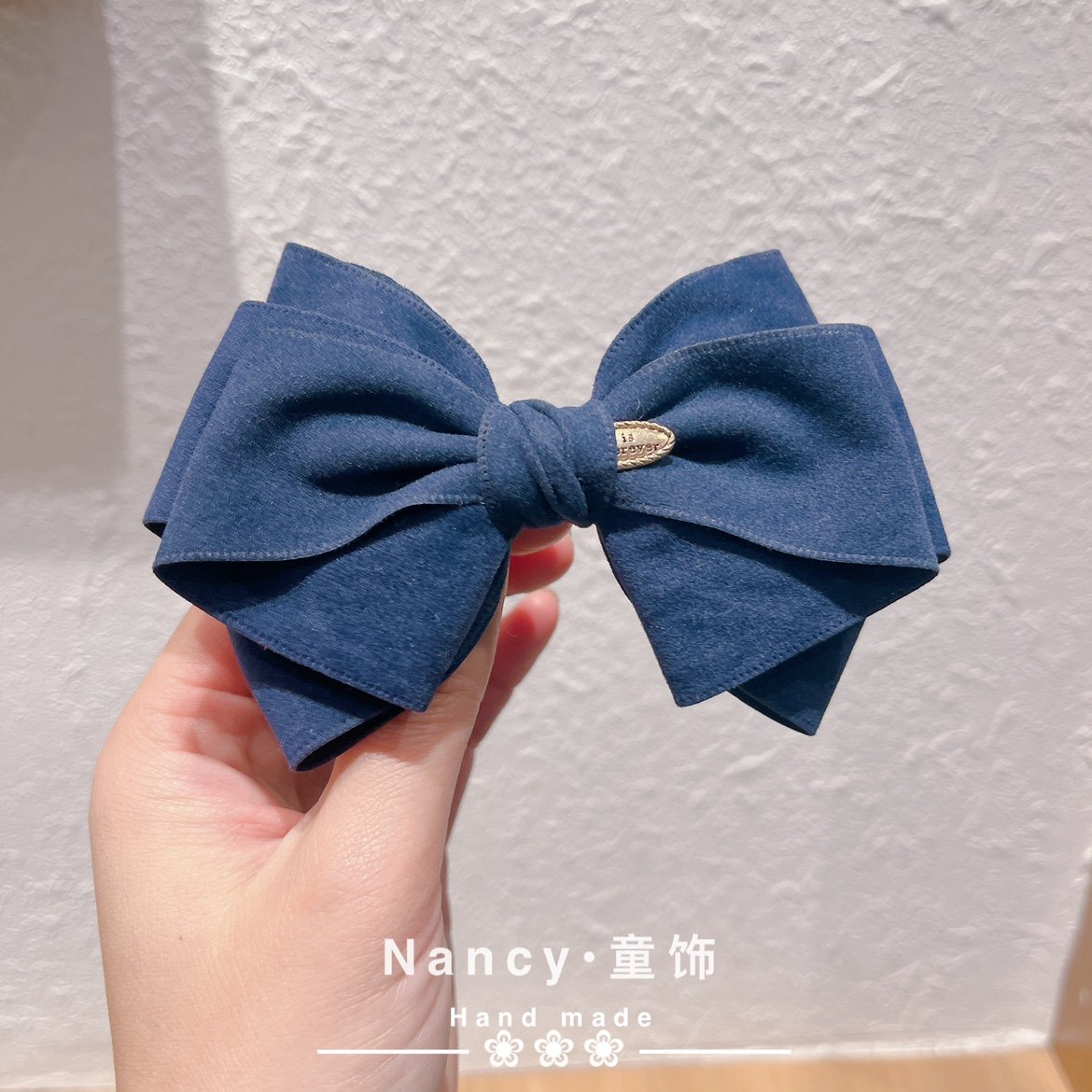 高级感秋冬款蓝色鹿皮绒儿童蝴蝶结发饰弹簧夹女孩头饰顶夹简约