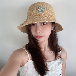 高品质天然手工编织拉菲草圆顶草帽女度假森系花朵小檐草编渔夫帽