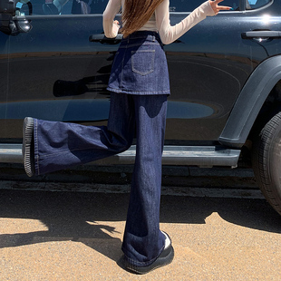 春秋款一体假两件长款牛仔裤裙女广州新塘单宁深蓝色拼接微喇叭裤