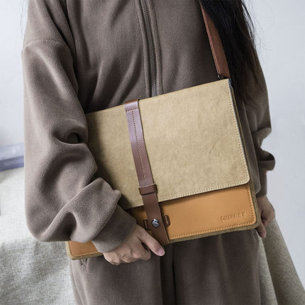 高颜值水洗牛皮纸电脑包手提通勤笔记本收纳包适用苹果13.3联想华为14寸防震内胆包女士公文包男士16寸皮质款