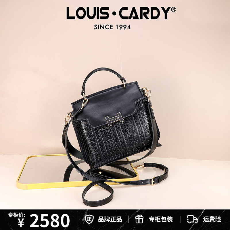 路易卡迪 双面背黑色字母压纹翻盖手提单肩斜挎水桶包配两条肩带