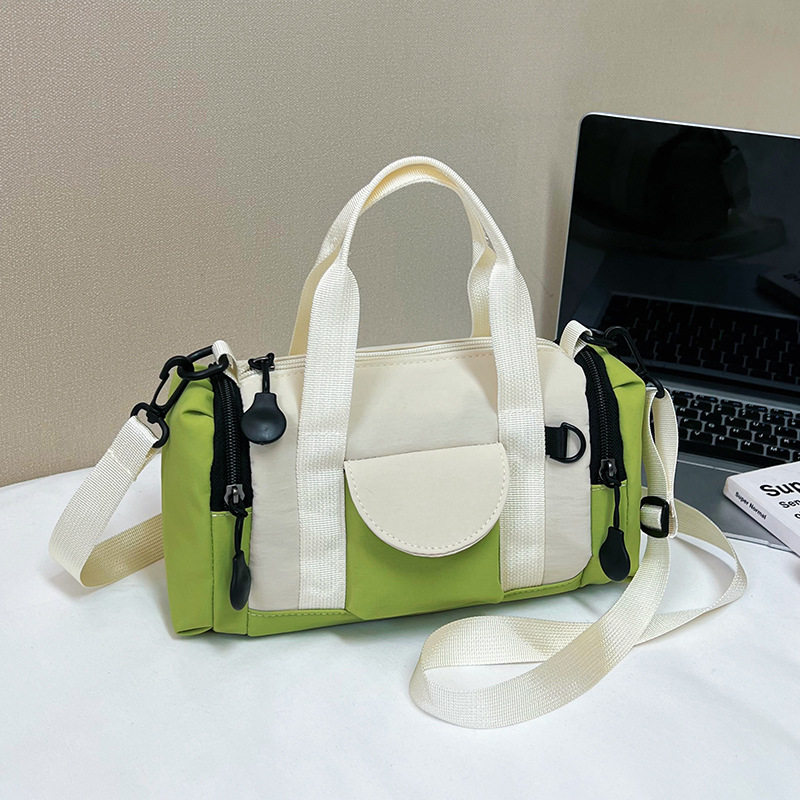 2026新款潮撞色圆筒包手提斜挎两用多功能休闲百搭通勤女包妈咪包