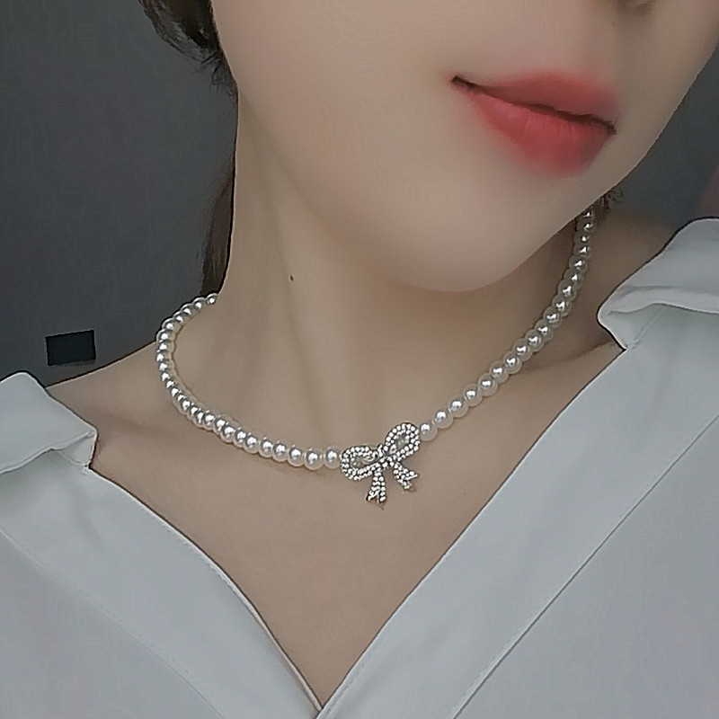 珍珠母贝圆珠链女蝴蝶结吊坠