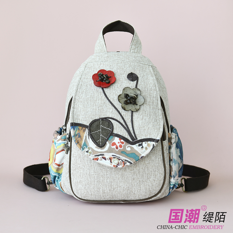 新款民族风棉麻复古双肩包女百搭书包手工编织小清新花朵背包