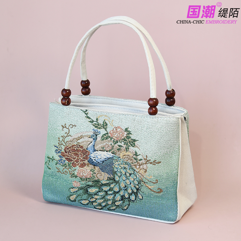 新款民族风刺绣帆布包多隔层手提包休闲风多夹层手拎袋拉链女布包