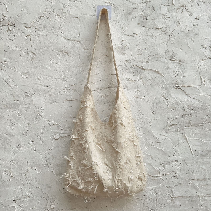 废土风流苏托特包大容量帆布包小众棉麻斜跨包民族风布包袋女单肩