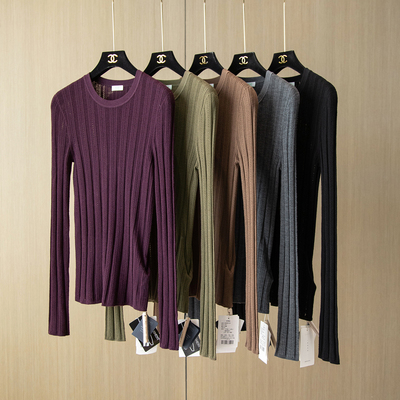 JC*P精纯针桃孔镂空修身坑条上衣