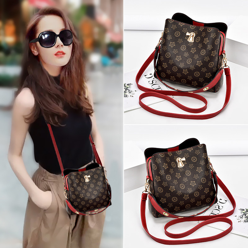 夏季高级感水桶包女2020新款潮时尚流行大容量女士宽带单肩斜挎包