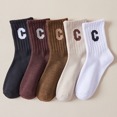 秋冬袜子女ins潮百搭字母中长筒学院风网红冬季运动外穿黑色长袜