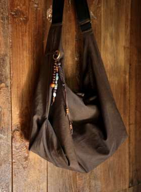 WATEREVER「侠客」泥土棕色厚实纯棉帆布单肩斜挎饺子包原创包挂