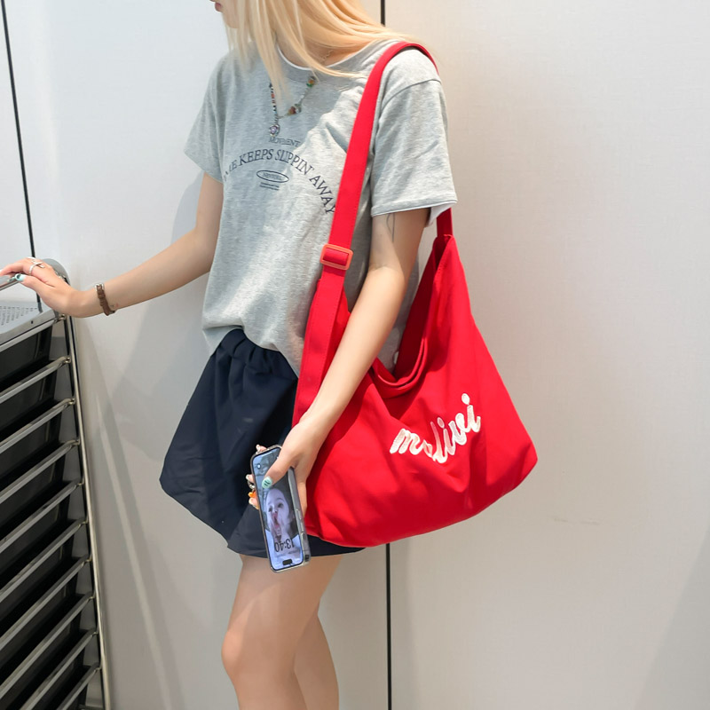 韩系彩色帆布包包女2025夏季新款可调节肩带斜挎包休闲百搭托特包